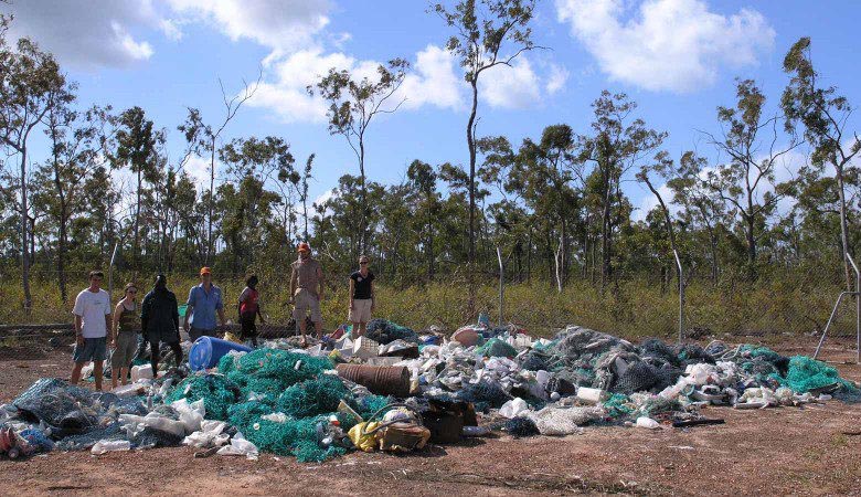 Volunteers with results of one cleanup of Cape Arnhem after it has been taken to the local dump near Nhulunbuy. Photo Sam Muller.